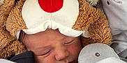 Noé participe au concours pour gagner de l'argent avec cette photo : baby, blanket, child, closeup, cozy, cute, face, hand, headwear, indoors, infant, newborn, polka_dots, portrait, red_nose, reindeer_costume, resting, sleeping, soft_toys, warm