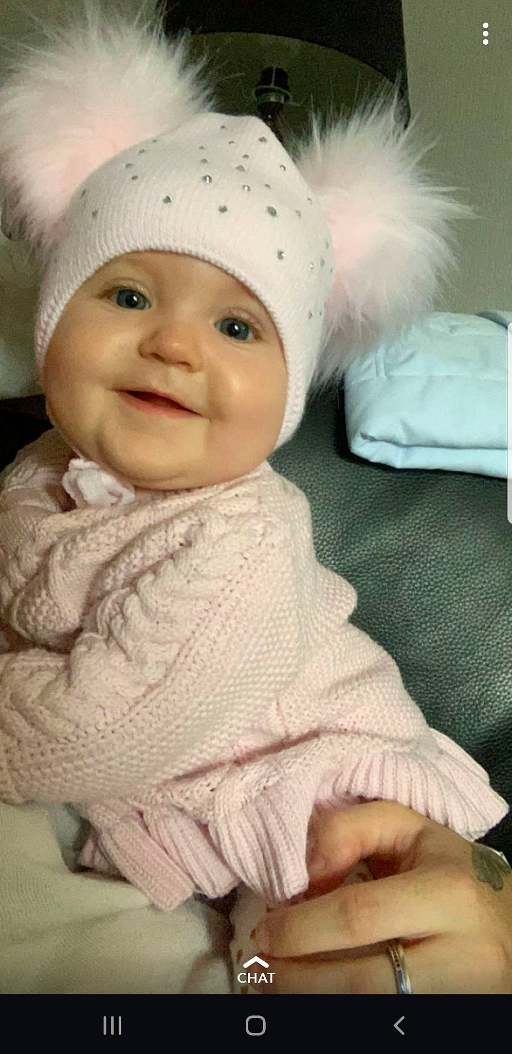 Esmèe joined the competition — help win amazing prizes! baby, baby_laughing, baby_toddler_clothing, bonnet, cheek, child, head, headgear, headwear, knit_cap, knitting, person, skin, sleeve, smile, toddler