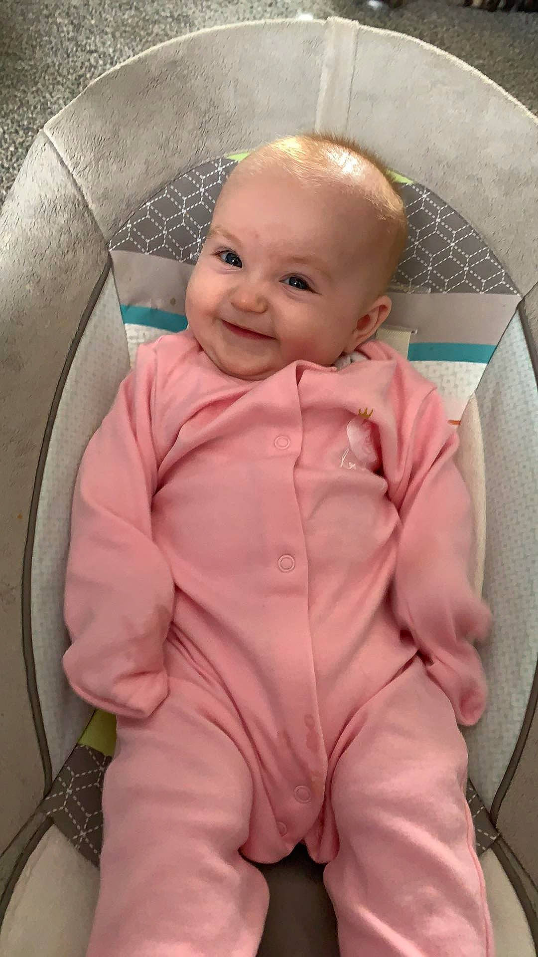 Esmèe is registered to the contest to win money with this photo: baby, baby_products, baby_toddler_clothing, cheek, child, eye, face, head, nose, person, pink, product, skin, toddler