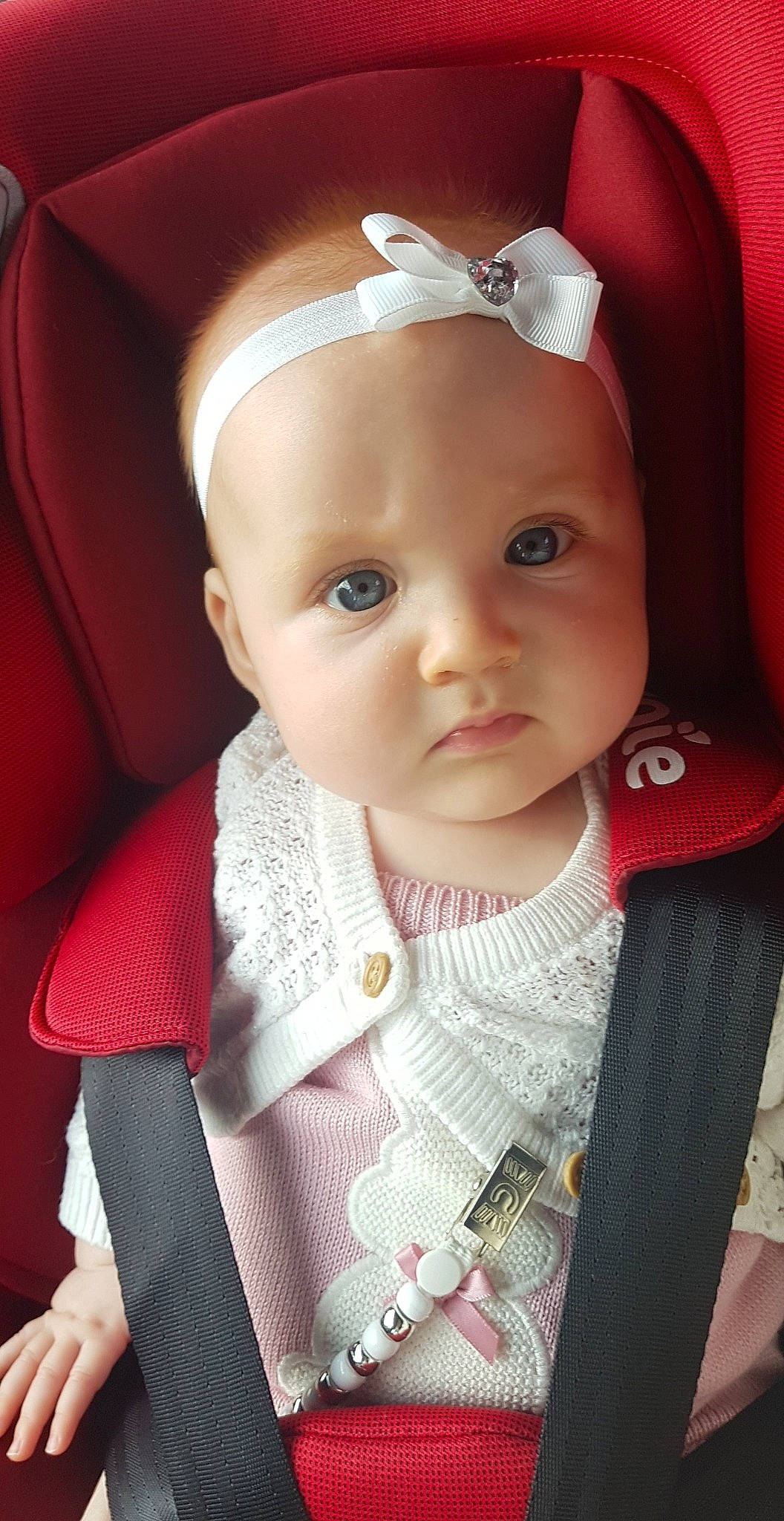 Esmèe is registered to the contest to win money with this photo: baby, cheek, child, doll, eye, face, forehead, hair_accessory, head, lip, outerwear, person, pink, skin, smile, toddler