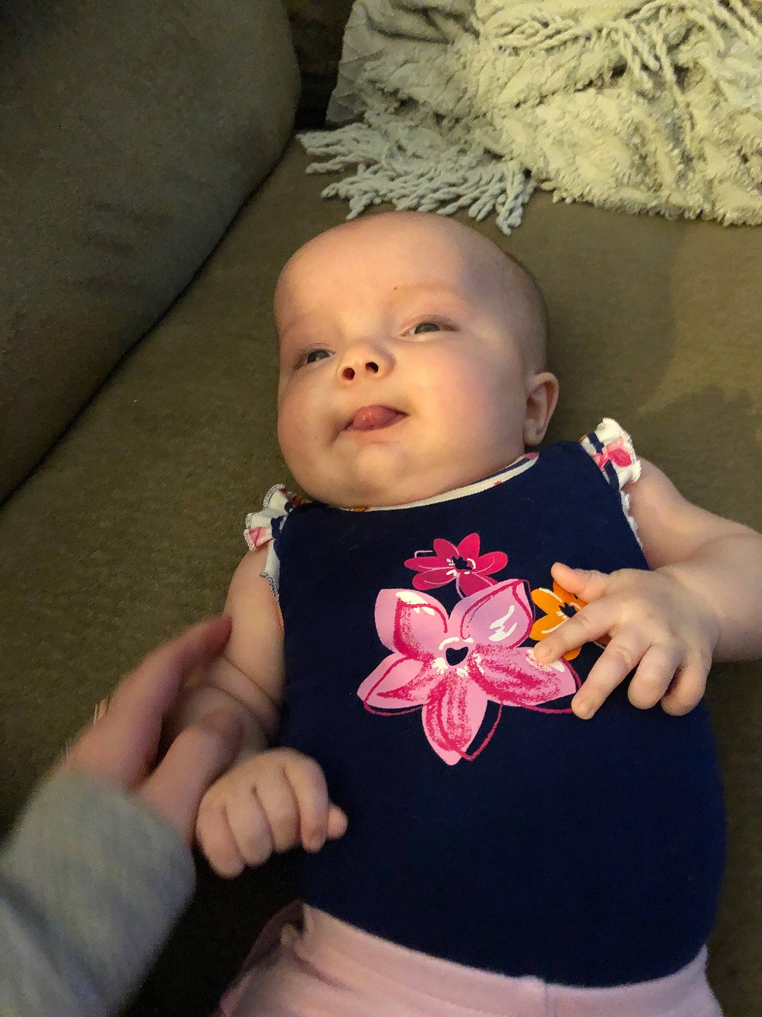 Emmaline is registered to the contest to win money with this photo: baby, cheek, child, fashion_accessory, finger, flower, hair_accessory, hand, headgear, nail, person, petal, photography, pink, plant, toddler