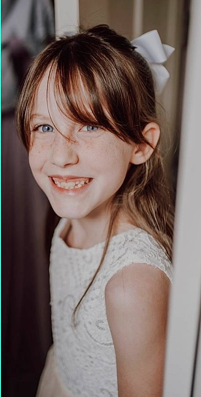 Andi is registered to the contest to win money with this photo: bangs, chin, cool, ear, eyebrow, eyelash, face, flash_photography, hair, happy, iris, jaw, joy, layered_hair, lip, neck, nose, person, shoulder, skin