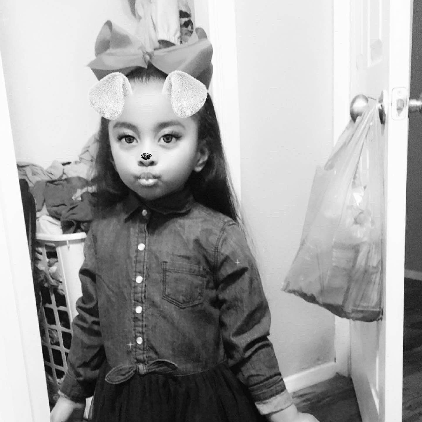 Zaniyah is registered to the contest to win money with this photo: black_and_white, child, clothing, costume, design, ear, fashion, hair_accessory, headpiece, monochrome, pattern, person, photograph, snapshot, style, toddler