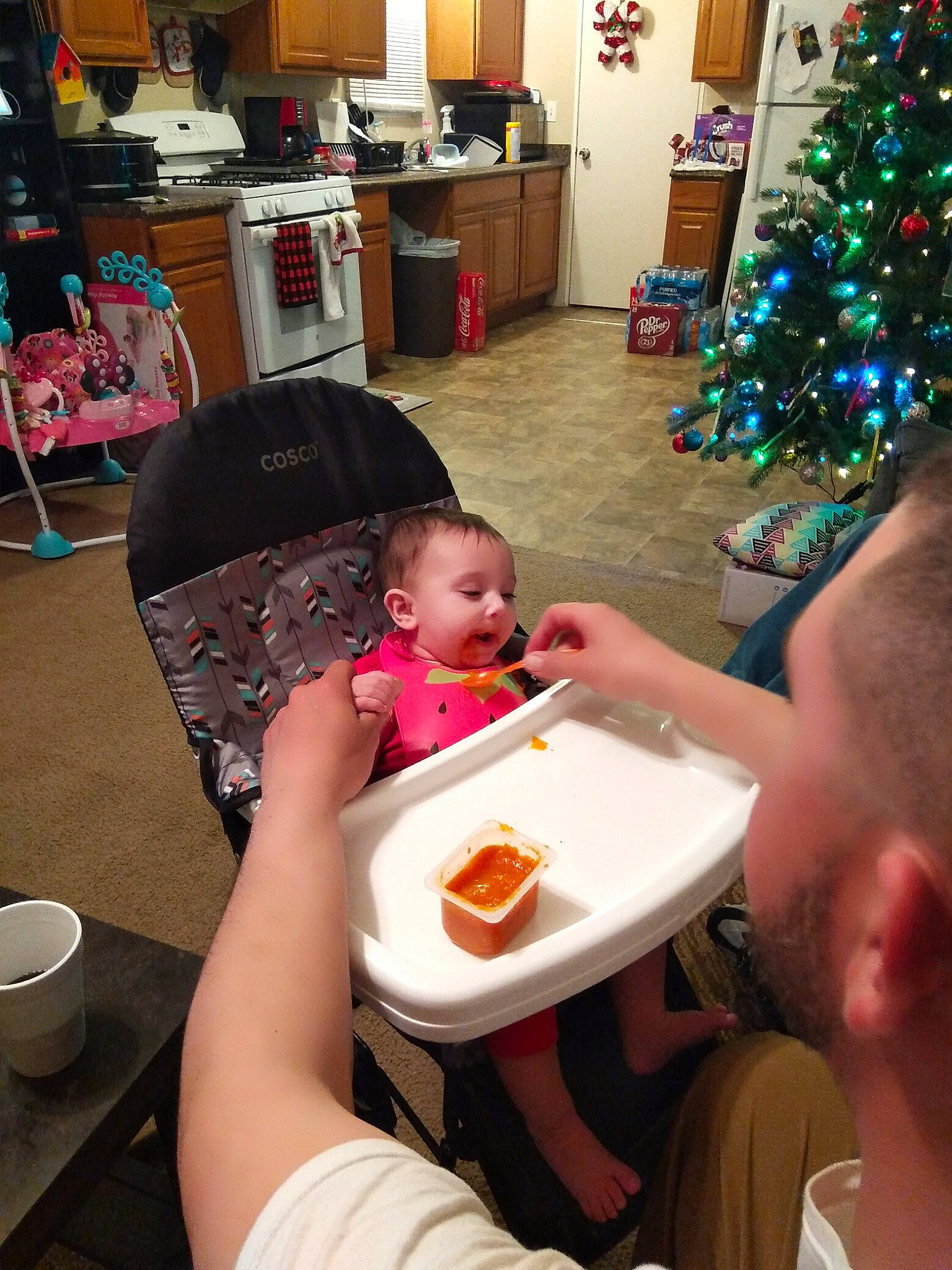 Emma is registered to the contest to win money with this photo: breakfast, brunch, child, christmas, comfort_food, dish, eating, fast_food, food, lap, lunch, meal, person, toddler