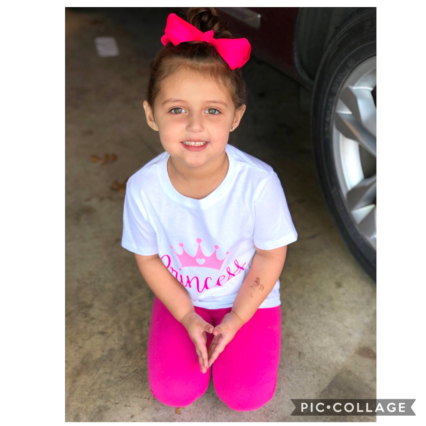 Mariyah is registered to the contest to win money with this photo: arm, auto_part, baby_toddler_clothing, beauty, child, child_model, clothing, ear, footwear, headgear, joint, joy, leg, person, pink, product, shoe, smile, sportswear, t_shirt