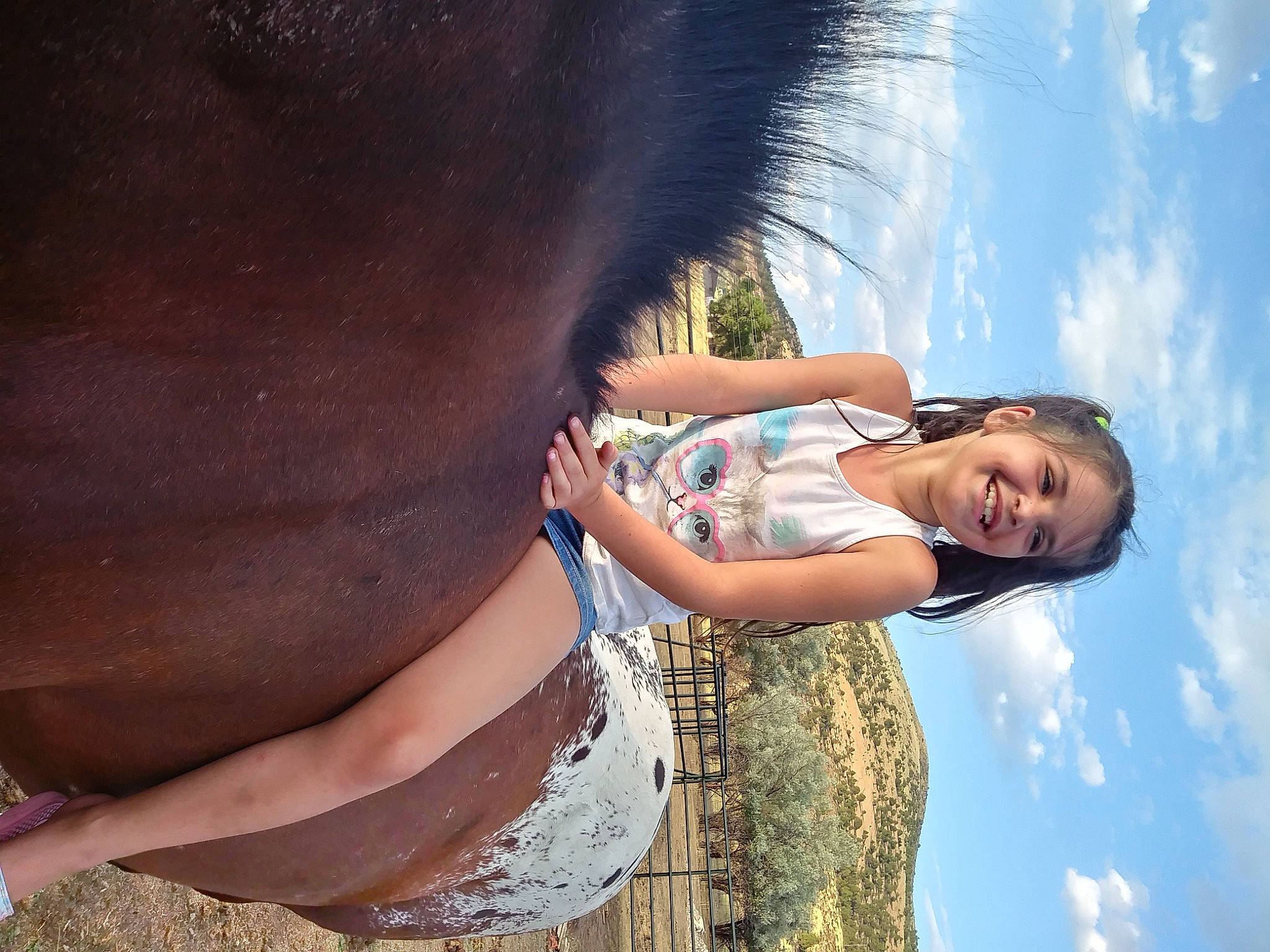 Londyn is registered to the contest to win money with this photo: abdomen, cloud, elbow, electric_blue, eyewear, flash_photography, fun, gesture, grass, happy, human_body, human_leg, joy, leisure, people_in_nature, person, plant, sky, smile, tree