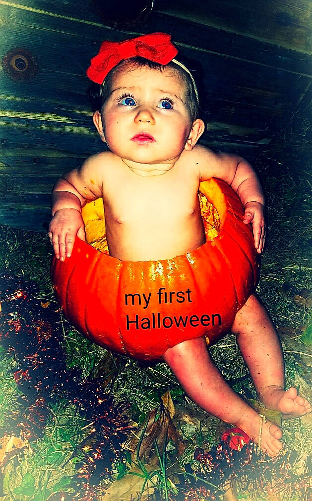 Tinsley joined the competition — help win amazing prizes! baby, baby_products, cheek, child, child_model, eye, face, fun, happy, headgear, headwear, lifejacket, nose, orange, person, personal_protective_equipment, photography, photomontage, plant, red