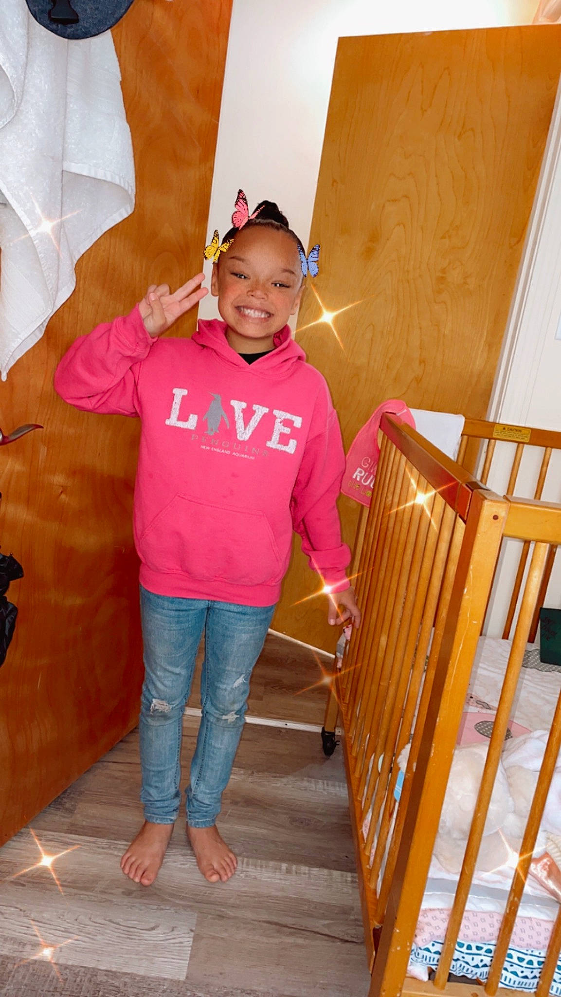 Jaelisse is registered to the contest to win money with this photo: cap, denim, flooring, fun, happy, hardwood, jeans, joy, leisure, magenta, pattern, person, pink, sleeve, smile, t_shirt, thigh, toddler, varnish, waist