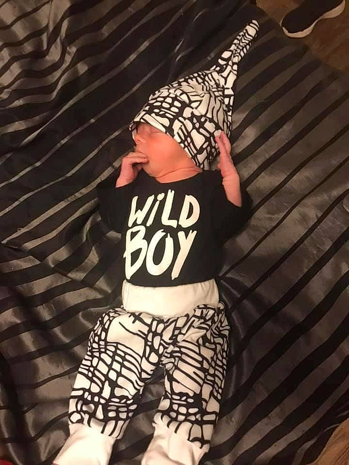 Kolby is registered to the contest to win money with this photo: cap, entertainment, event, fashion_accessory, fashion_design, flash_photography, fun, headwear, human_body, music, pattern, performance, performing_arts, person, shorts, sleeve, sportswear, street_fashion, t_shirt, thigh