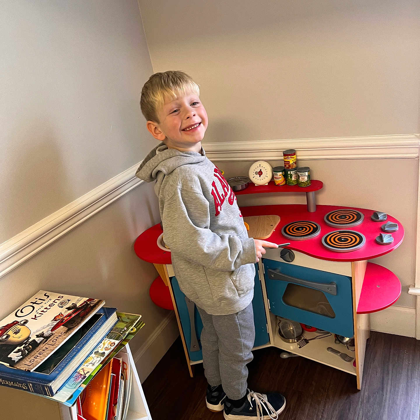 Chance joined the competition — help win amazing prizes! boy, child, clothing, desk, face, footwear, furniture, head, indoors, interiordesign, male, pants, person, photography, plywood, portrait, shelf, shoe, table, wood