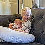 baby, toddler, child, smiling, hugging, couch, pillow, indoor, blonde_hair, sleeping, happy, person, cozy, blanket, clothing, curtain, door, furniture, portrait, family