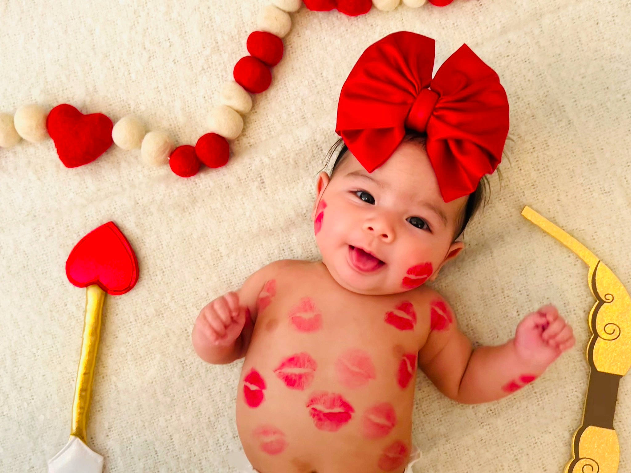 Analia is registered to the contest to win money with this photo: baby, baby_products, baby_toddler_clothing, carmine, child, costume_hat, event, facial_expression, fashion_accessory, finger, fun, happy, headwear, holiday, human_body, jewellery, nail, person, pink, smile