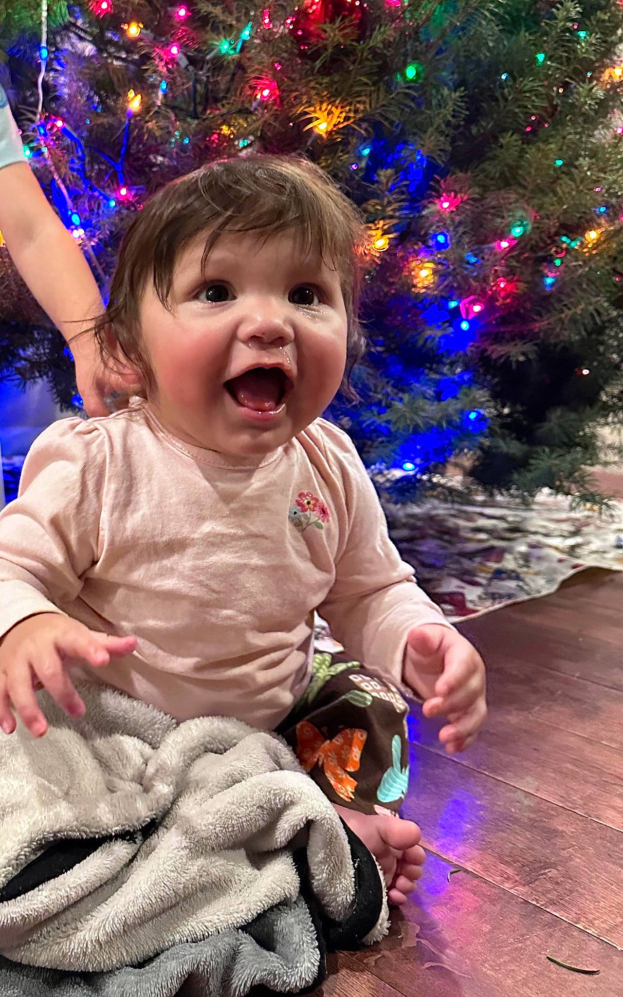 Zendaya is registered to the contest to win money with this photo: baby, baby_toddler_clothing, child, christmas_decoration, christmas_ornament, christmas_tree, event, facial_expression, flash_photography, fun, happy, head, light, lighting, person, photograph, purple, snapshot, standing, toddler