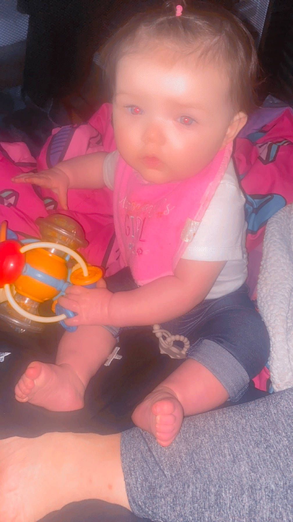 Kevana is registered to the contest to win money with this photo: baby, baby_toddler_clothing, cheek, eye, finger, fun, hand, happy, head, iris, lap, leg, lip, mouth, nail, nose, person, pink, skin, thumb