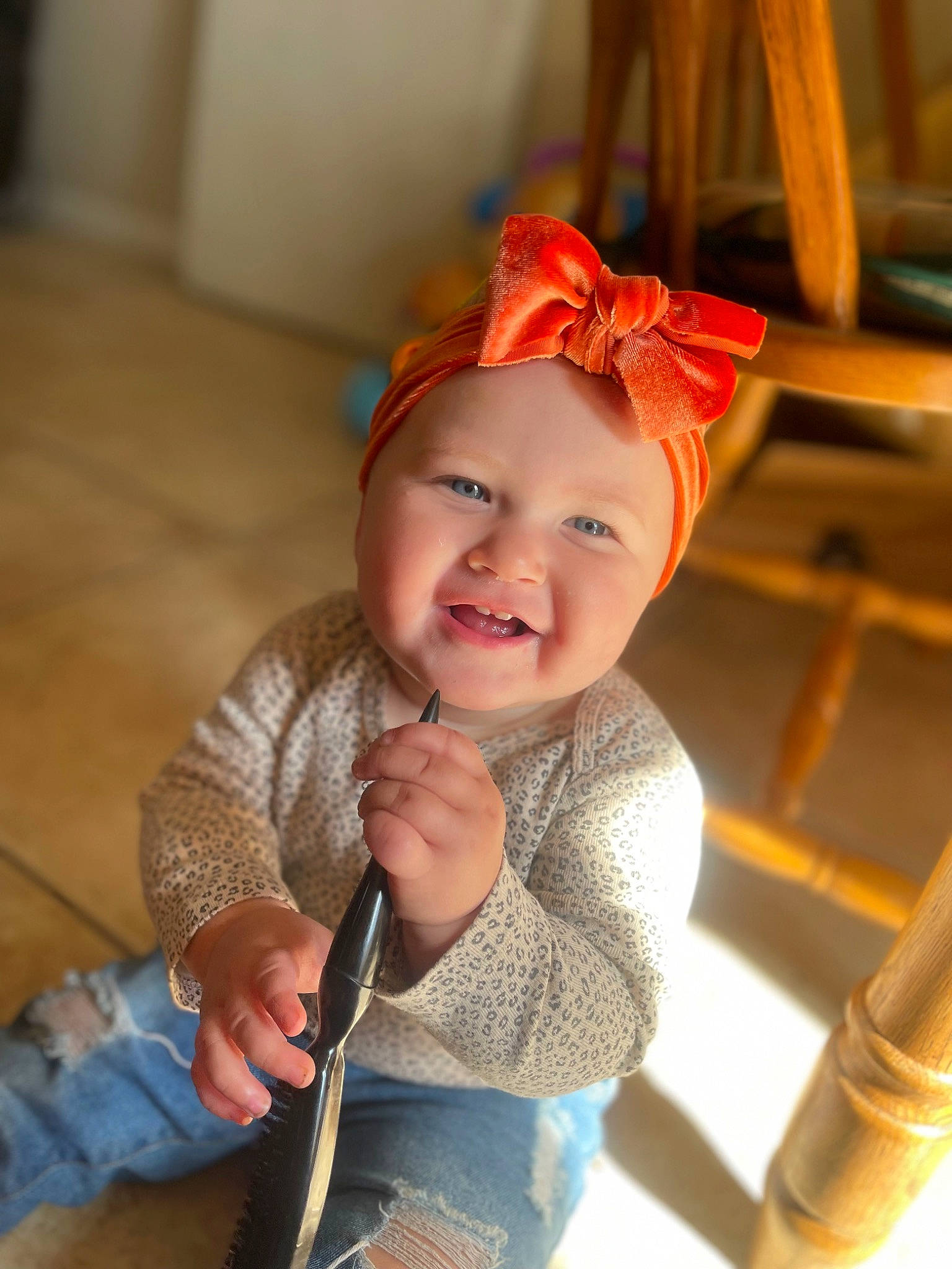 Adalynn joined the competition — help win amazing prizes! baby, baby_products, baby_toddler_clothing, child, costume_hat, eye, face, fashion_accessory, flooring, fun, hair, happy, head, headwear, jacket, person, room, skin, smile, toddler