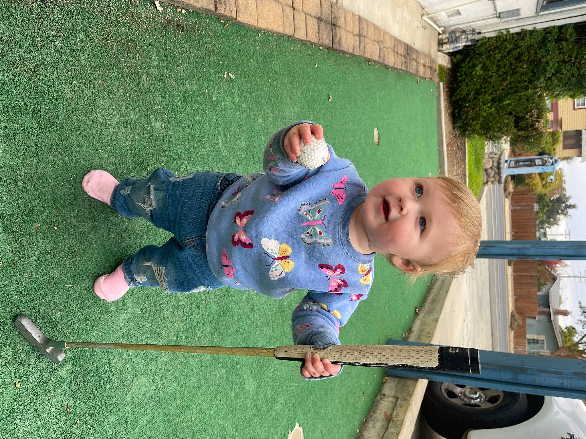 Adalynn joined the competition — help win amazing prizes! baby, baby_toddler_clothing, child, fun, grass, green, jacket, leisure, person, plant, recreation, sitting, smile, toddler, tree