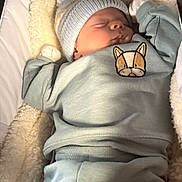 Noah is registered to the contest to win money with this photo: baby, sleeping, hat, knitted, blanket, cozy, infant, clothing, soft, cute, rest, warm, child, portrait, indoors, peaceful, newborn, apparel, comfort, nap