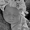 Emma joined the competition — help win amazing prizes! baby, black_and_white, bow, child, closeup, clothing, cozy, cute, fabric, face, headband, infant, newborn, peaceful, portrait, rest, sleeping, soft, texture, wrapped