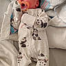 Sebastian is registered to the contest to win money with this photo: newborn, baby, sleeping, pacifier, onesie, panda_print, blanket, bed, cozy, infant, cute, child, resting, soft, fabric, clothing, indoors, peaceful, portrait, toddler