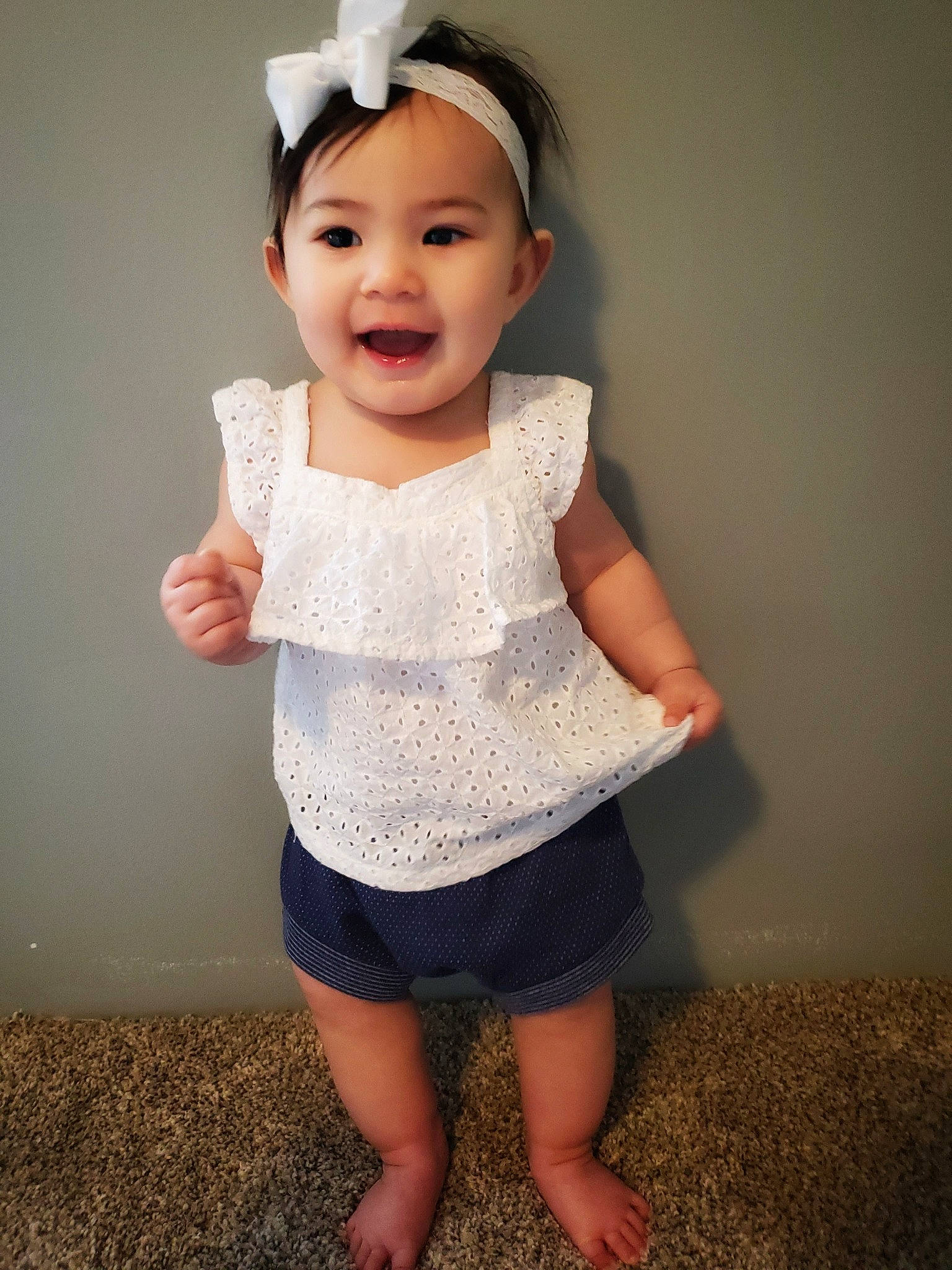 Rowyn joined the competition — help win amazing prizes! baby, baby_toddler_clothing, cheek, child, clothing, dress, hair_accessory, head, joy, pattern, person, skin, sleeve, standing, toddler, white