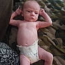 Kayson is registered to the contest to win money with this photo: baby, infant, child, diaper, lying_down, blanket, indoor, portrait, face, arms, legs, bald, awake, neutral_expression, bed, couch, patterned_fabric, timestamp, casual_photo, relaxed