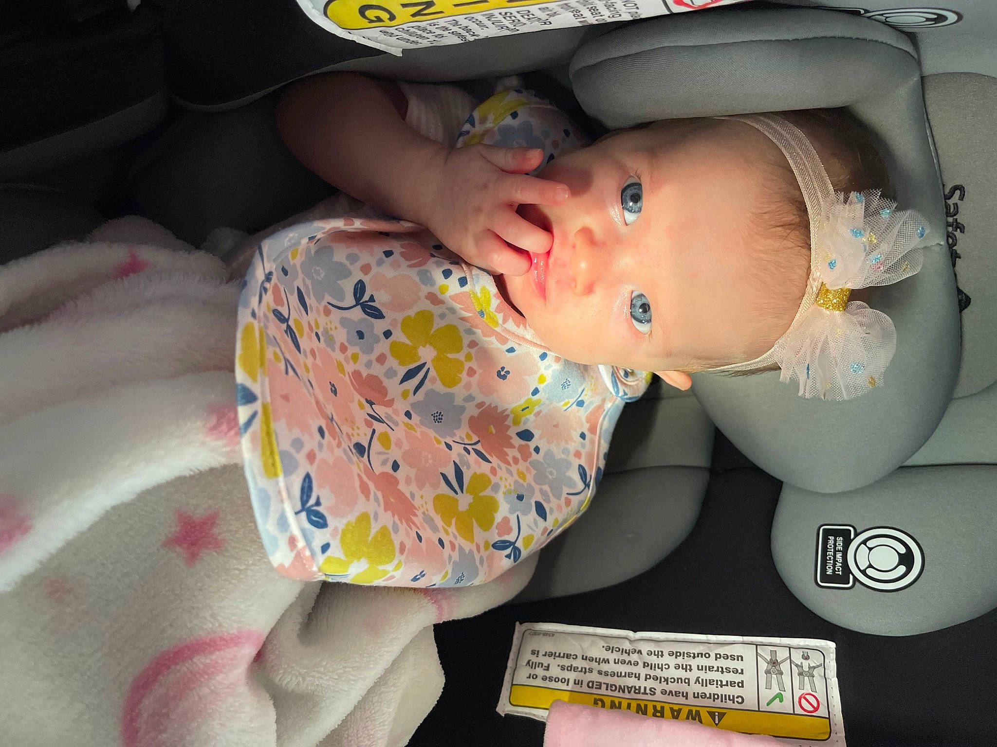 Everleigh is registered to the contest to win money with this photo: auto_part, baby, baby_carriage, baby_products, baby_safety, baby_toddler_clothing, car_seat, cheek, child, comfort, linens, packing_materials, person, plastic, sitting, toddler, vehicle_door