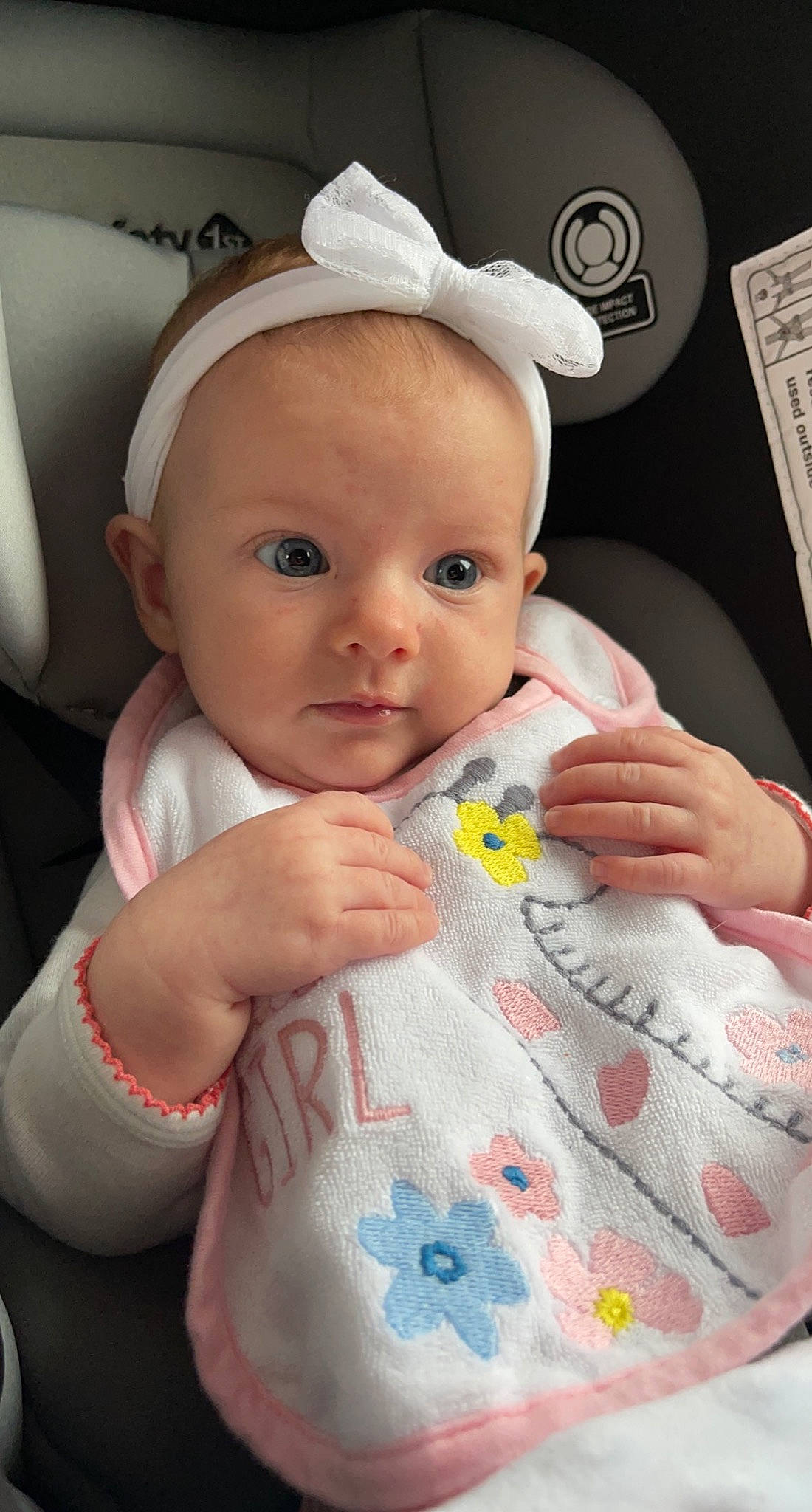 Everleigh is registered to the contest to win money with this photo: baby, baby_toddler_clothing, cheek, comfort, dress, eye, eyebrow, eyelash, facial_expression, finger, hand, headgear, iris, lip, nose, person, pink, skin, sleeve, toddler