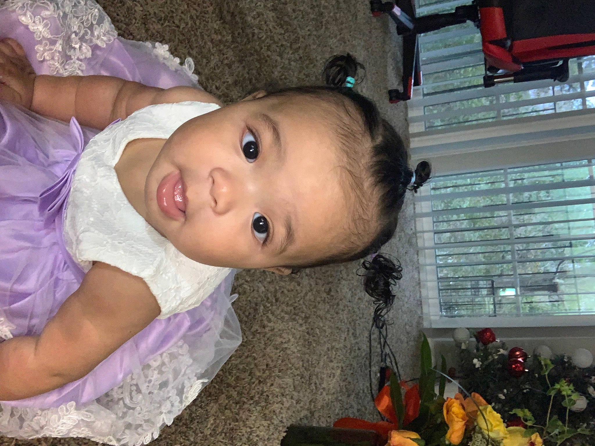 Malani is registered to the contest to win money with this photo: baby, baby_toddler_clothing, cheek, child, dress, eyebrow, eyelash, fruit, fun, happy, iris, lip, mouth, natural_foods, nose, person, pink, plant, skin, smile