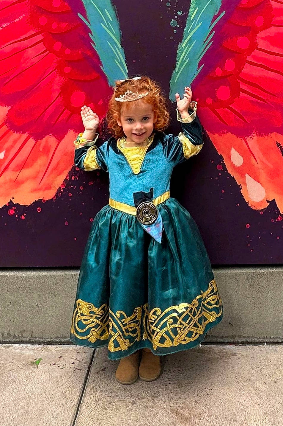 Gwendolyn joined the competition — help win amazing prizes! azure, child, costume, electric_blue, event, fashion_accessory, feather, fun, happy, headgear, joy, magenta, mythical_creature, outerwear, person, pink, smile, snapshot, textile, toddler