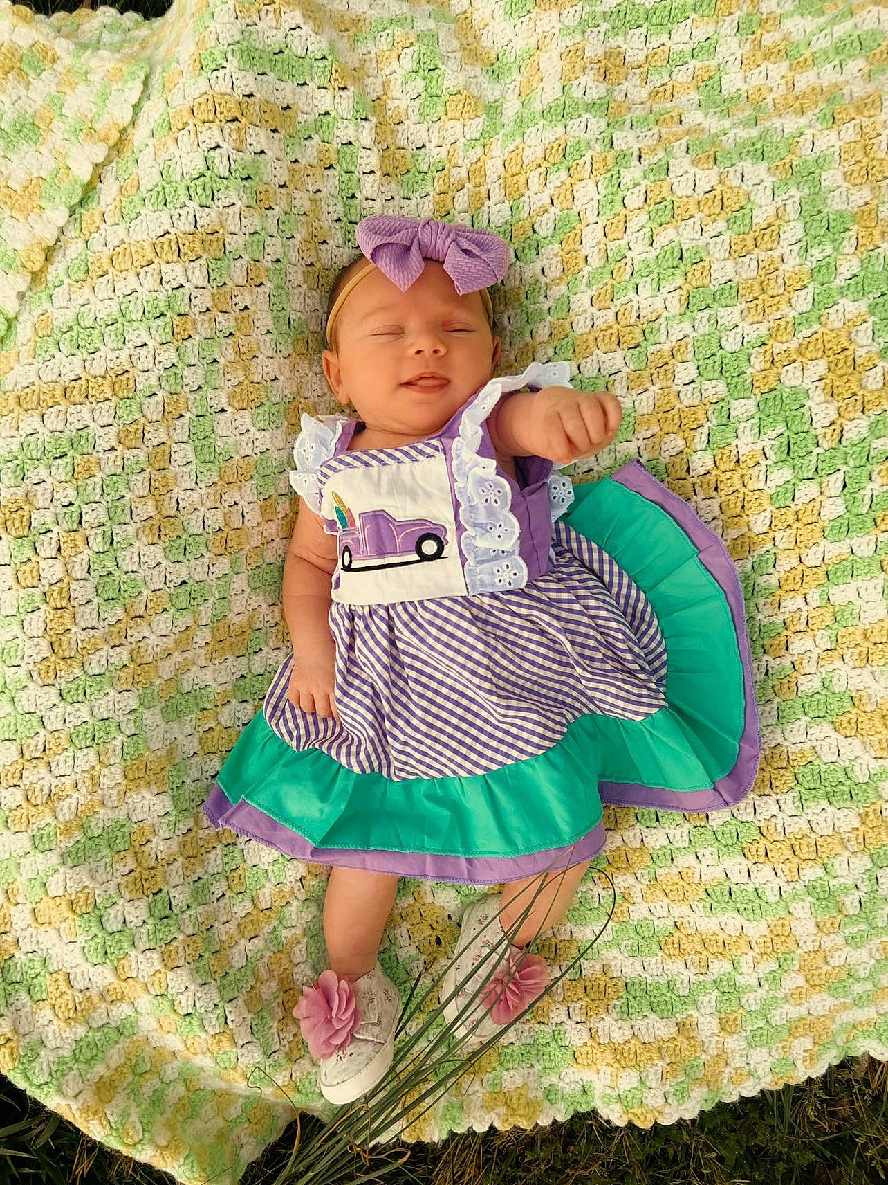 Jacelyn joined the competition — help win amazing prizes! baby_toddler_clothing, day_dress, dress, fashion_accessory, glasses, grass, grass_family, happy, hat, headgear, headwear, leaf, magenta, pattern, people_in_nature, person, plant, sitting, sleeve, sunglasses