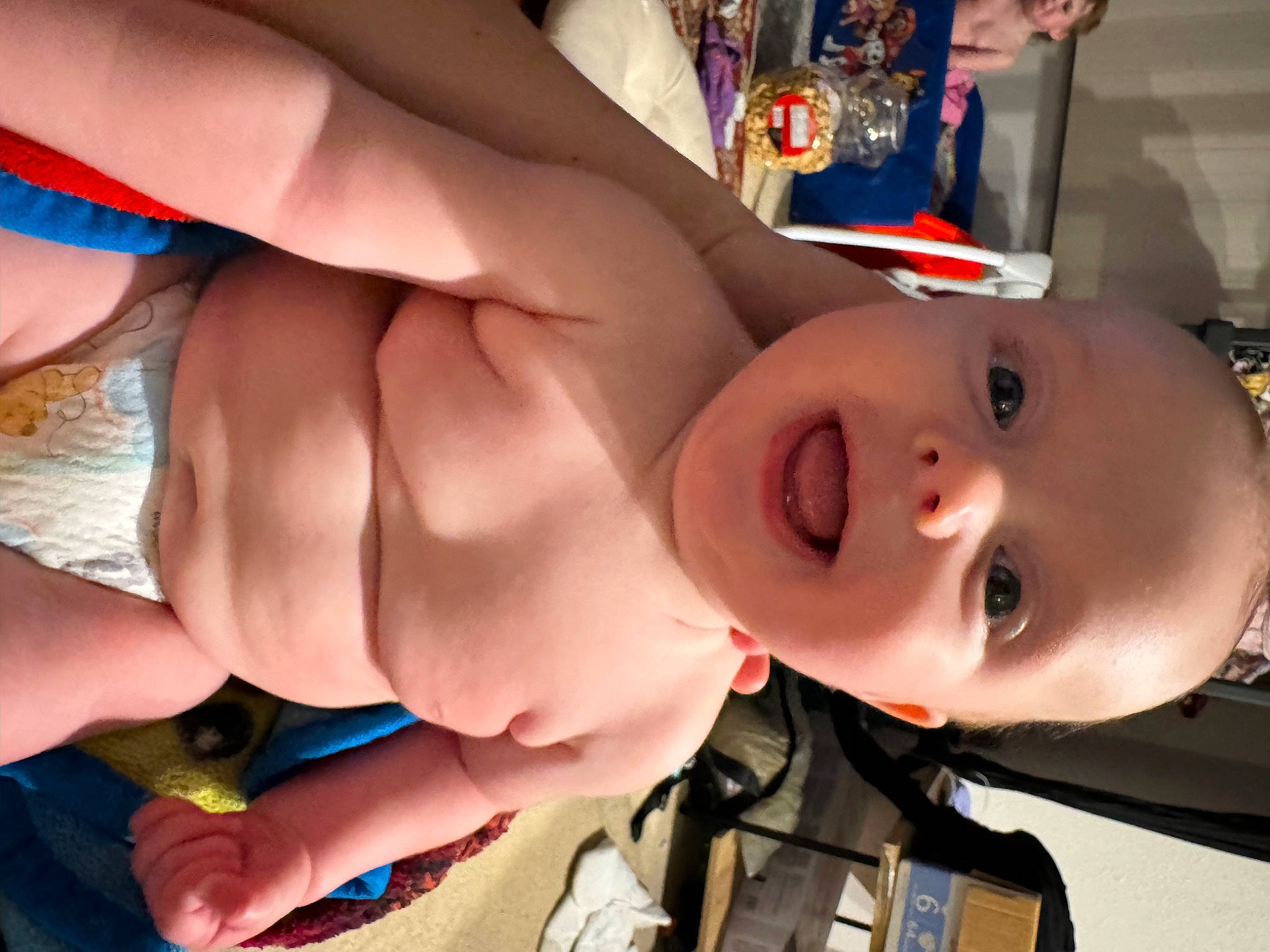 Kelly is registered to the contest to win money with this photo: baby, cheek, chest, child, facial_expression, finger, fun, gesture, hand, happy, human_body, mouth, muscle, nail, nose, person, skin, smile, thumb, toddler