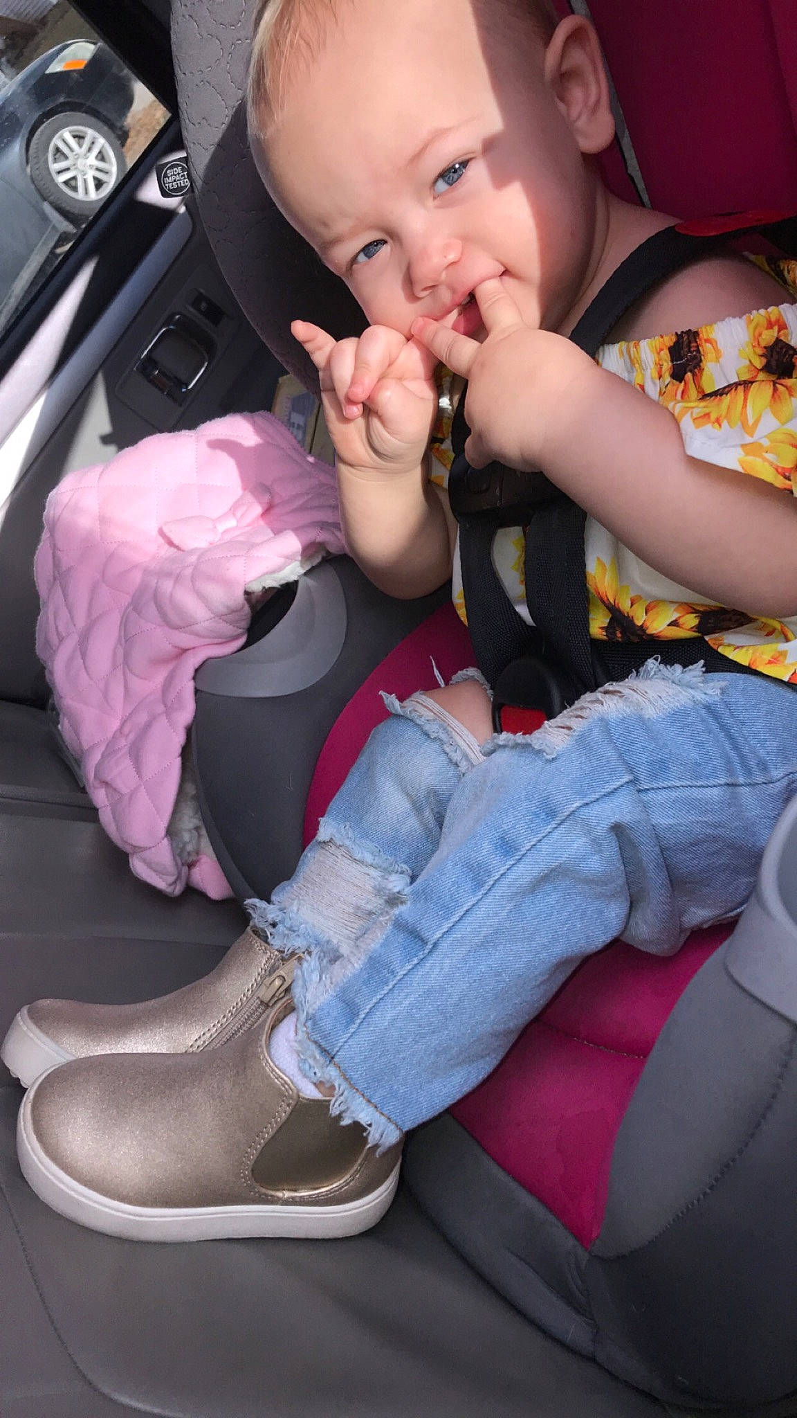 Oakley joined the competition — help win amazing prizes! auto_part, baby_in_car_seat, car_seat, child, footwear, leg, person, pink, shoe, sitting, toddler