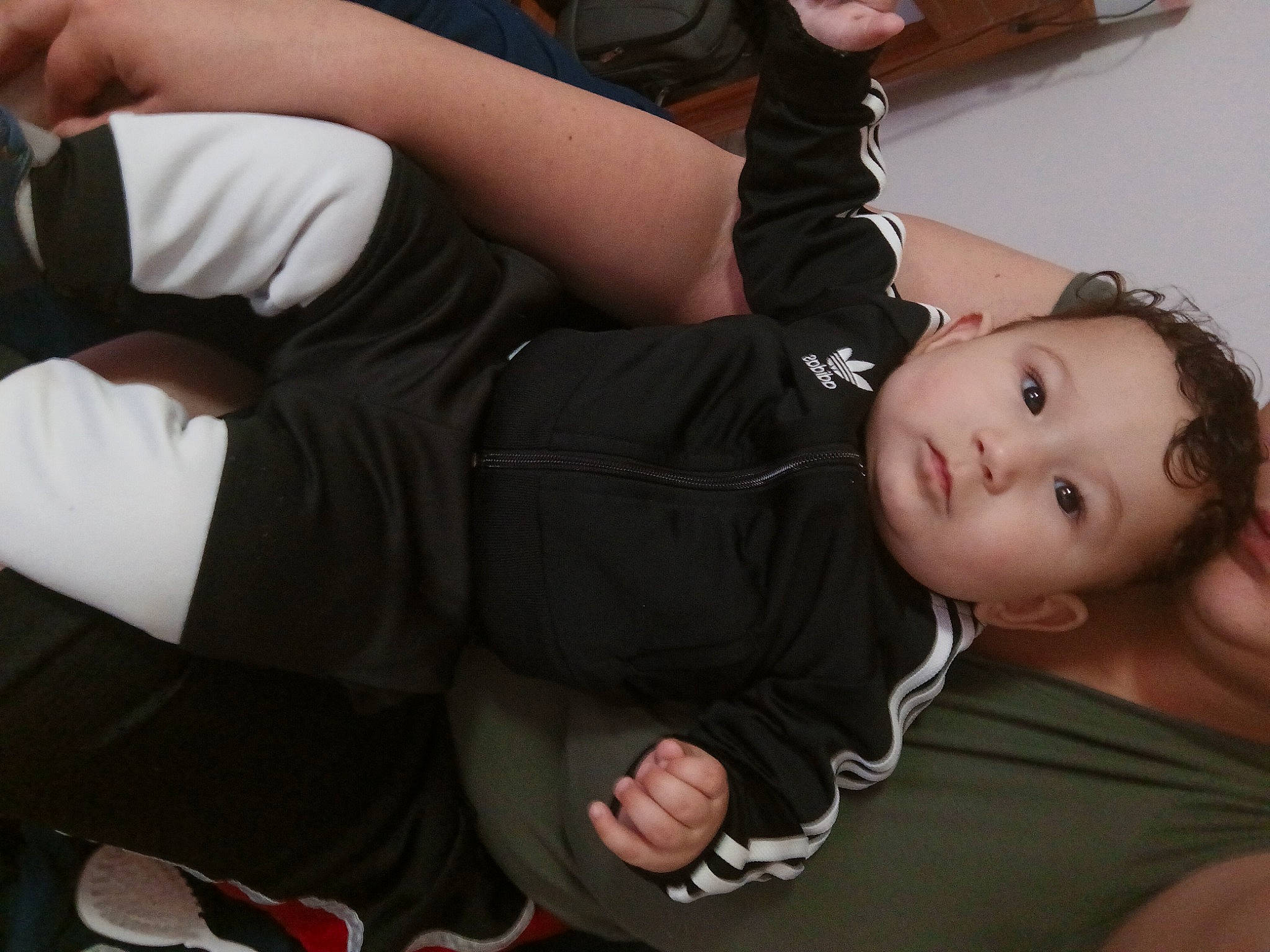 Adriel is registered to the contest to win money with this photo: arm, black_hair, chest, comfort, elbow, eyelash, finger, flash_photography, gesture, happy, human_leg, joint, knee, leg, person, sitting, sleeve, thigh, thumb, trunk