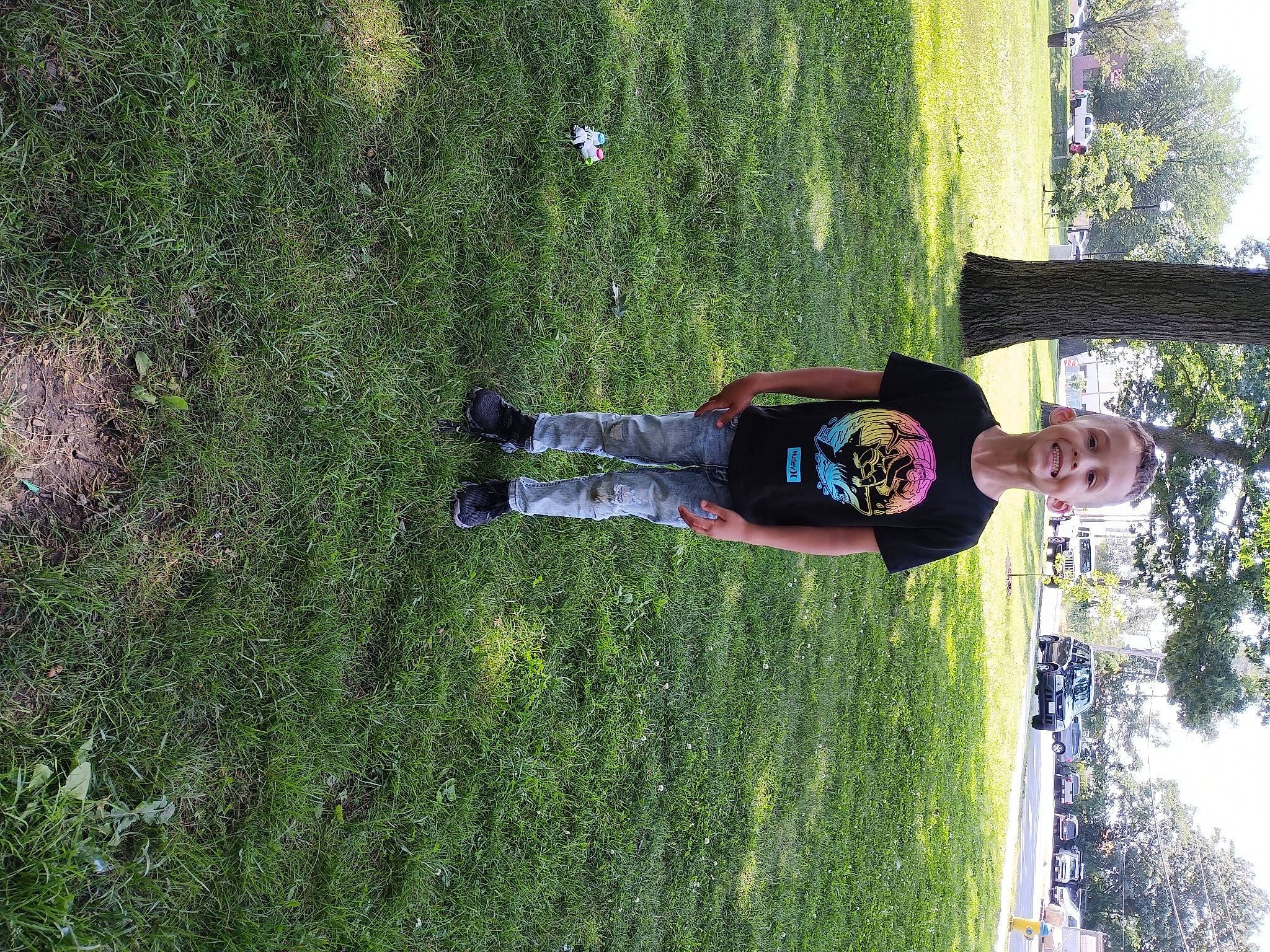 Aydin joined the competition — help win amazing prizes! fun, grass, grass_family, grassland, groundcover, hat, joy, landscape, lawn, leisure, people_in_nature, person, plant, recreation, shadow, shrub, sky, soil, t_shirt, tree