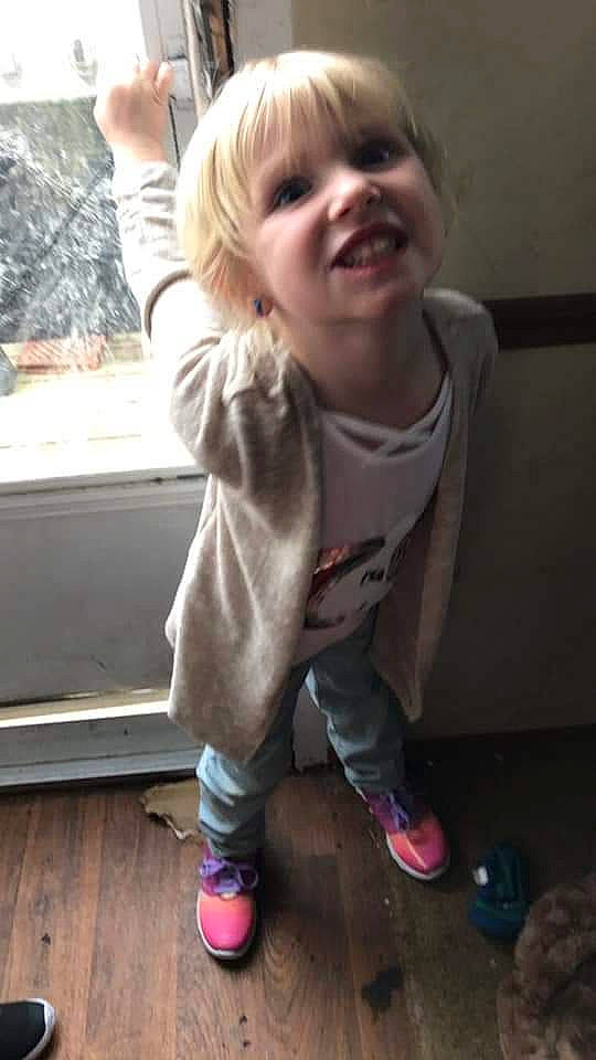 Kinlee is registered to the contest to win money with this photo: blond, cheek, child, cool, ear, facial_expression, finger, fun, joy, laugh, leg, nose, outerwear, person, play, sleeve, smile, standing, t_shirt, thumb