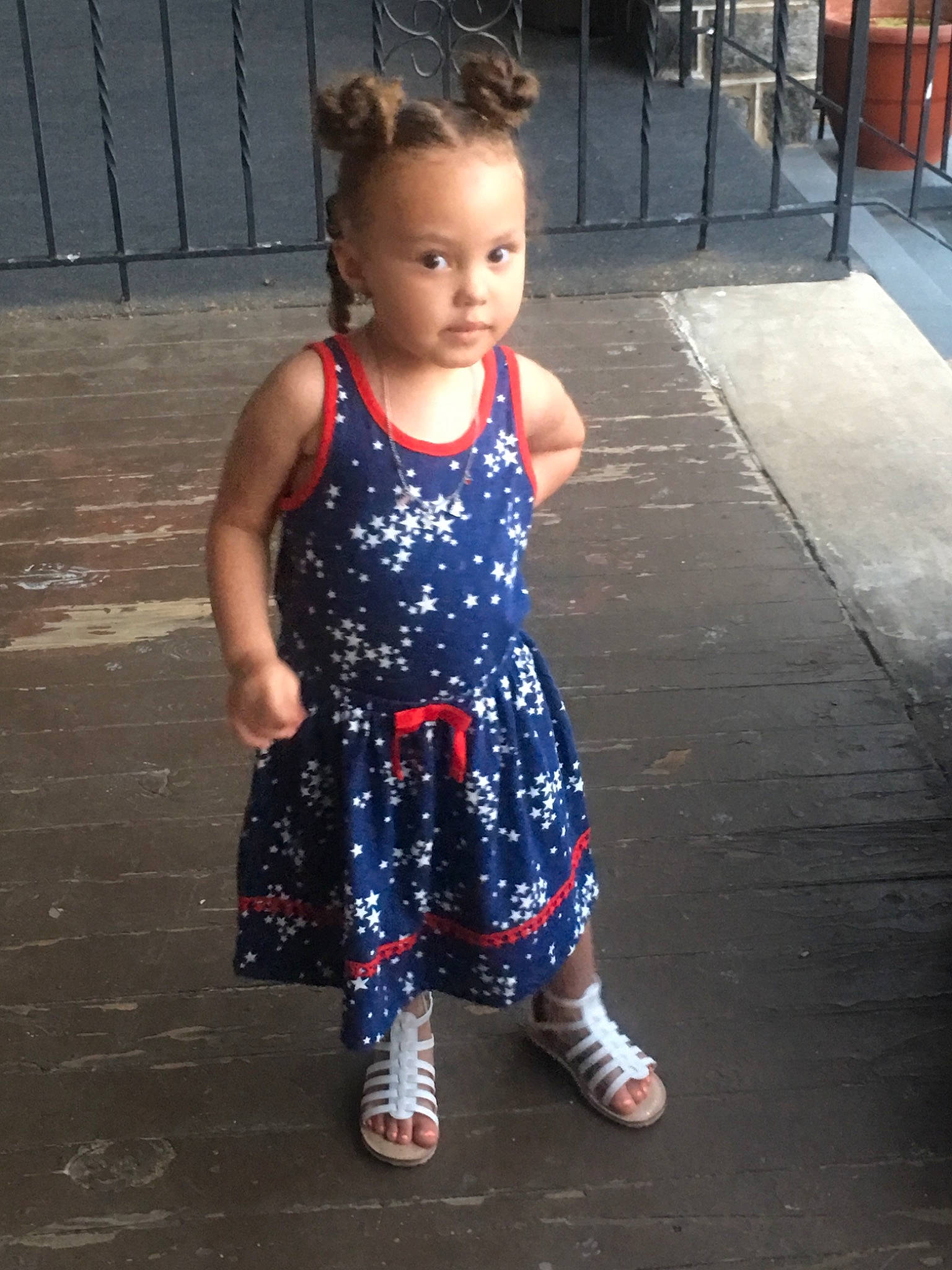 Nyla is registered to the contest to win money with this photo: child, dress, person, smile, toddler