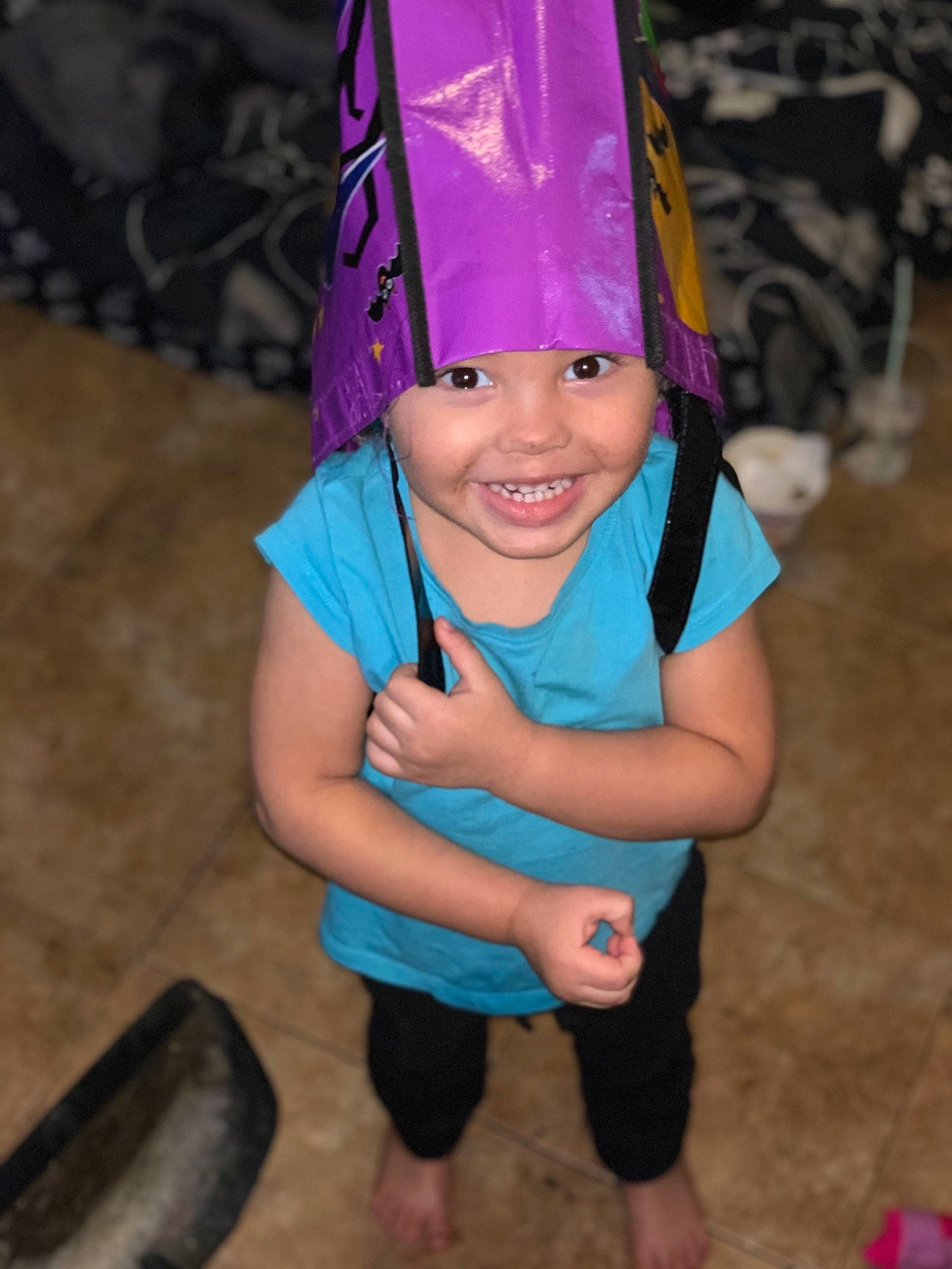 Nyla is registered to the contest to win money with this photo: child, costume, fun, joy, person, pink, play, purple, smile, toddler, vacation