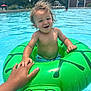 Giovanni joined the competition — help win amazing prizes! toddler, child, pool, water, float, inflatable, green, turtle, summer, outdoor, happy, smiling, hand, swimwear, curly_hair, sunlight, recreation, fun, person, leisure