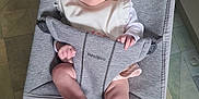 Ruby-Mae joined the competition — help win amazing prizes! baby, baby_bouncer, babybjorn, barefoot, child, clothing, cute, expression, face, floor, gray, headband, indoor, infant, kitchen, looking, person, relaxed, seat, soft_lighting