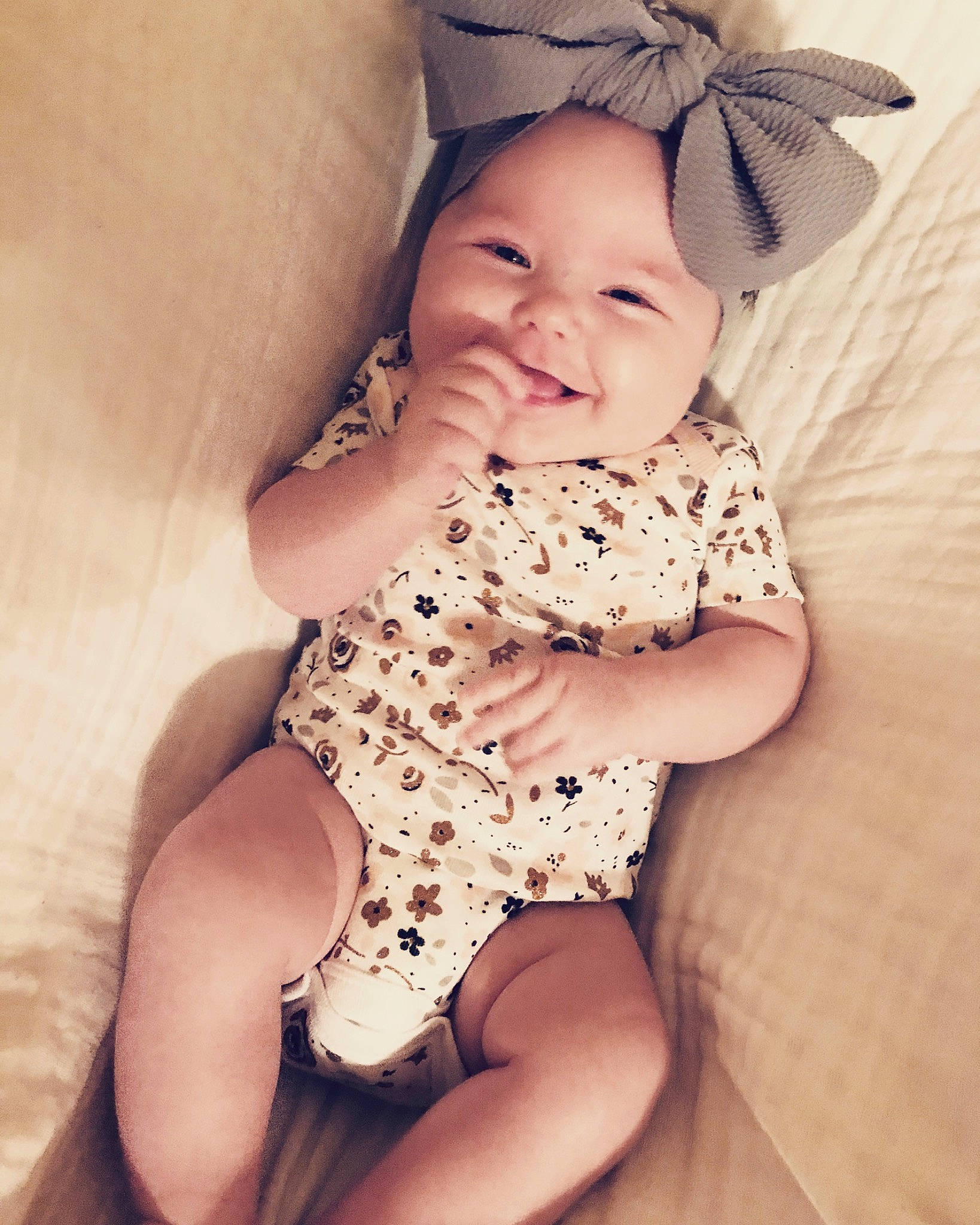 Teigann is registered to the contest to win money with this photo: baby, baby_toddler_clothing, beauty, cheek, child, dress, eye, face, finger, hand, head, headgear, headwear, human, joy, leg, lip, person, pink, product