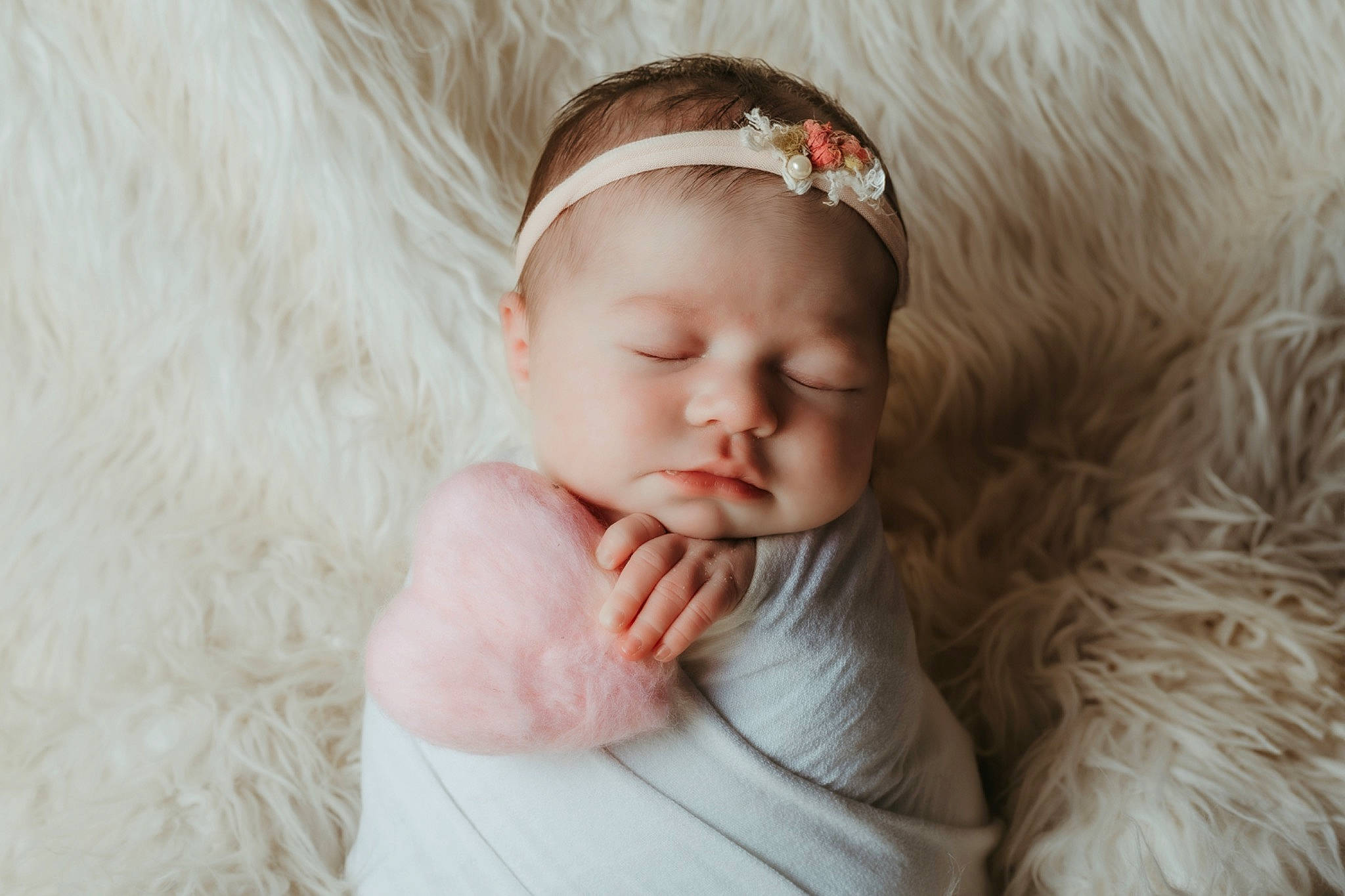 Adalynn Grace is registered to the contest to win money with this photo: baby, baby_toddler_clothing, cheek, comfort, ear, eye, eyelash, fashion_accessory, flash_photography, fur, hair_accessory, hand, happy, headband, headgear, headpiece, iris, linens, person, skin