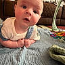 Rune joined the competition — help win amazing prizes! baby, blanket, blue, child, clothing, colorful, couch, curious, expression, fabric, face, floor, hands, home, indoor, infant, play, soft, toddler, toy