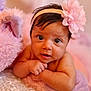 baby, infant, headband, flower, soft_toy, plush, blanket, lace, curious, lying_down, skin, hands, closeup, indoors, cute, child, portrait, young, adorable, pink