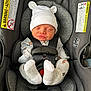 newborn, baby, infant, car_seat, hat, socks, sleeping, straps, gray, clothing, safety, warning_label, cute, child, seat, infant_seat, baby_clothes, cozy, peaceful, nap