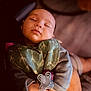Manoa participe au concours pour gagner de l'argent avec cette photo : baby, sleeping, pacifier, bib, arms, hand, soft_clothing, peaceful, indoor, person, infant, closeup, candid, family, comfort, toddler, nap, relaxation, skin, portrait