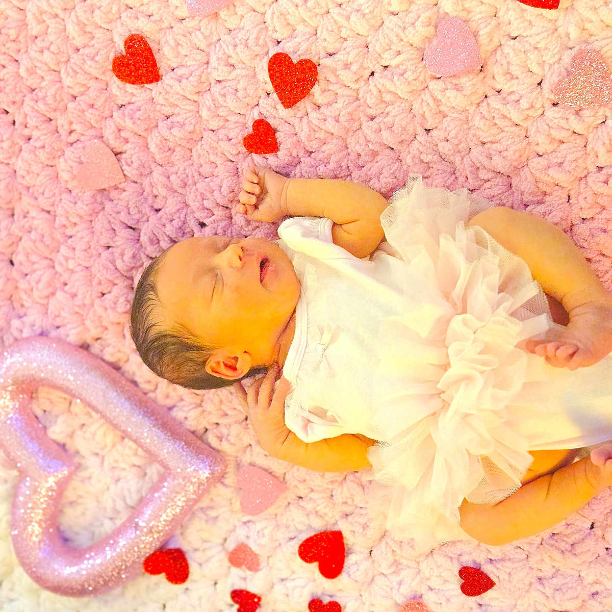 Kinslee joined the competition — help win amazing prizes! animal, baby, bed, blanket, crib, face, flower, furniture, head, homedecor, infantbed, newborn, person, petal, photography, plant, portrait, reptile, sleeping, snake