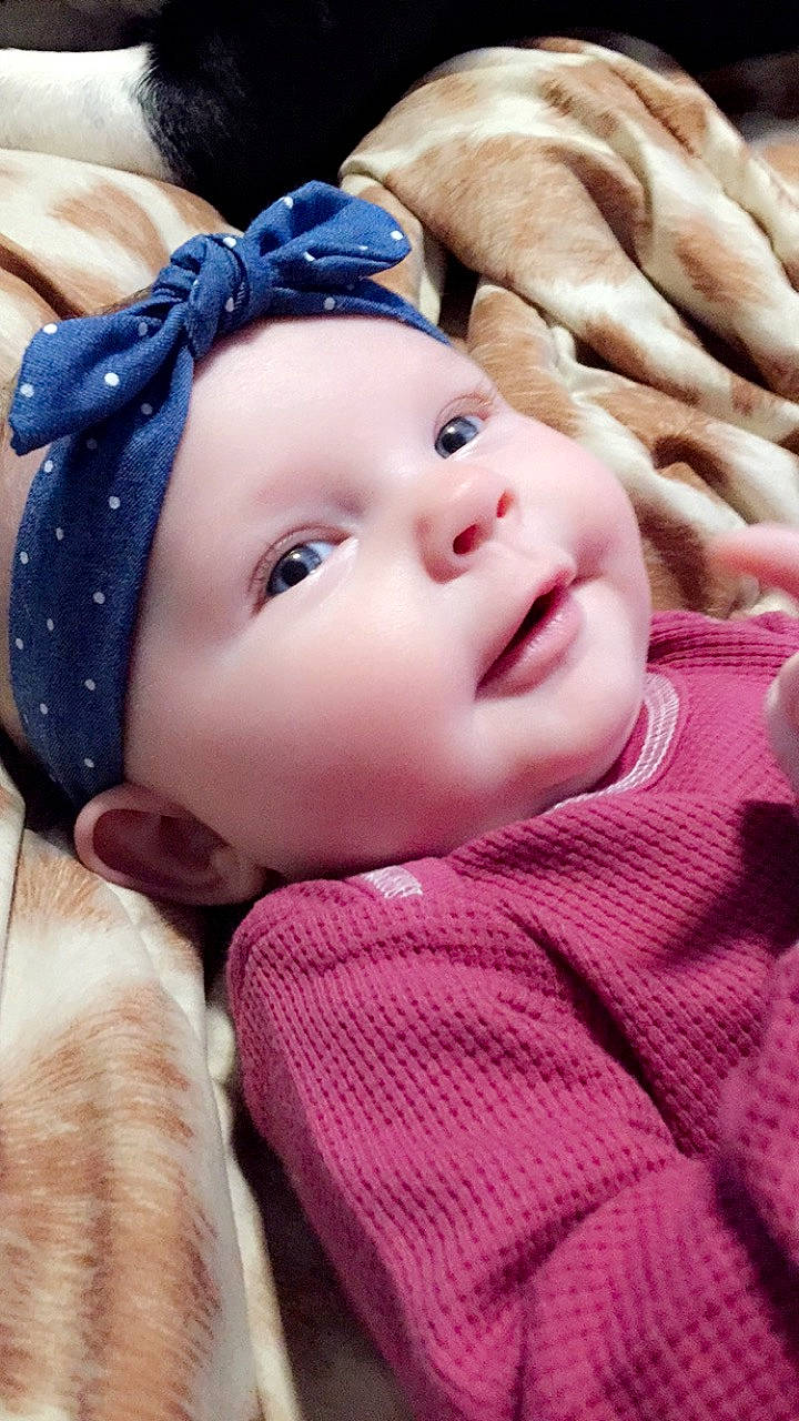 Kenleigh joined the competition — help win amazing prizes! baby, beauty, cheek, child, close_up, eye, face, hair_accessory, head, headgear, lip, nose, person, pink, skin, toddler