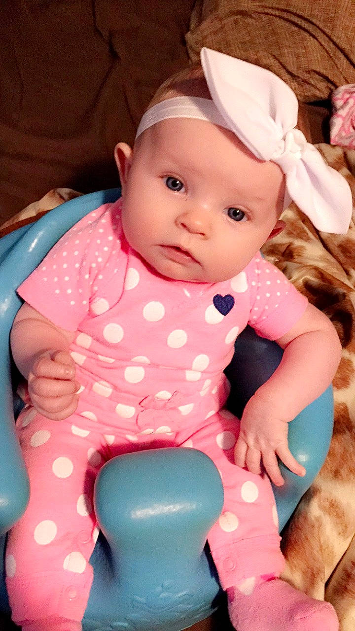 Kenleigh joined the competition — help win amazing prizes! baby, baby_products, baby_toddler_clothing, child, headwear, person, pink, sitting, skin, toddler