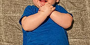 Caleb is registered to the contest to win money with this photo: baby, background, blue_clothing, child, closeup, cute, face, hands, happy, indoors, infant, lying_down, person, portrait, short_sleeves, skin, smiling, texture, toddler, young