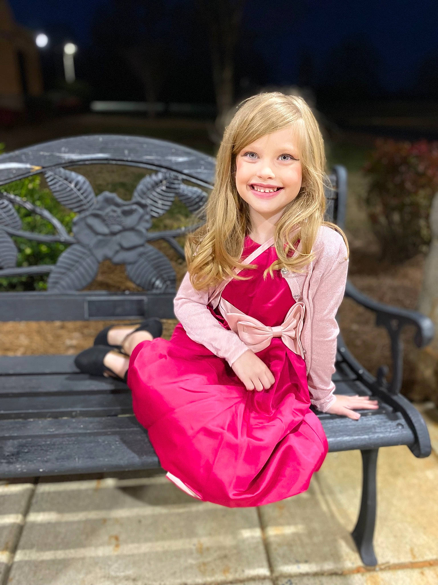 Presley is registered to the contest to win money with this photo: beauty, blond, brown_hair, eye, face, flash_photography, fun, grass, happy, head, human_leg, joy, knee, leisure, lip, magenta, person, pink, sitting, smile